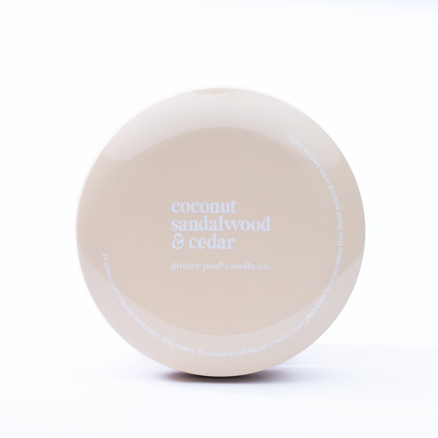 nude tin: coconut sandalwood + cedar  14 oz candle